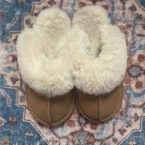 Cozy slippers. Super cute only worn a handful of times! Size 13